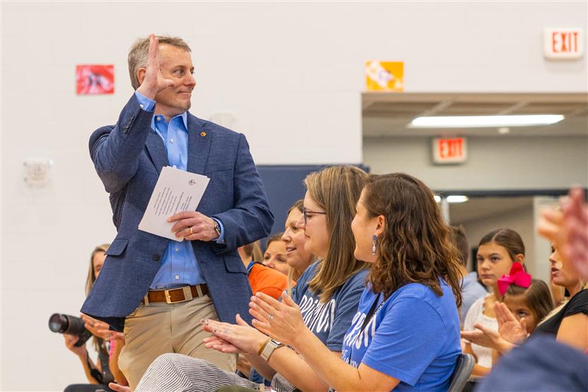 Students cut ribbon at new school